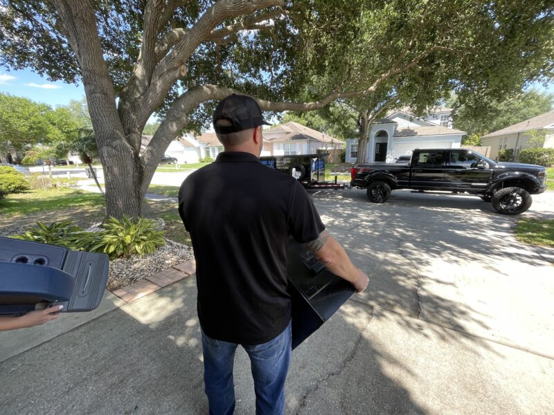 Lightning Bay Junk Man Carrying Black Box